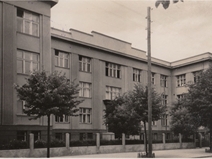 <p style="text-align: justify;">Interwar architectural processes are often described as a battlefield between modernity and traditional architectural forms. Faculty of Medicine is a clear illustration of such processes. When considering the architectural style of the building, we could use the common term <em>stripped classicism</em>. The structure and the facades clearly suggest symmetry, monumentality, features characteristic of historical objects. This is especially evident by the front of the building facing A. Mickevičius Street, whose central part and the entrance, enclosed by avant-corps, creates the impression of a historical palace. Yet, the side facing Spaustuvininkai Street is a lot more modern. A distinctive appearance is provided to it by the curved central avant-corps with a galore of windows (a rounded protrusion). A similar balance between modernism and historicism can be seen in the facades and the interior.</p>
<p style="text-align: justify;">Hence, architectural decisions go back and forth between modernism and historicism, meanwhile, in terms of functionality, the building was without a doubt contemporary and brought the conditions for medical students and professors closer to European standards. As noted in the press at that time, “the inspiration for the design came from the new Medical Faculty of Brussels University which is considered to be one of the best in Europe. Brussels faculty also fits seven medical faculty institutes; however, it cost around 12 million litas, as compared to only two million litas for Kaunas faculty. Kaunas building lacks the same splendour; the goal of its construction was both having practical amenities and achieving maximum savings”.</p>
<p style="text-align: justify;">The new building was designed as a universal and modern institution for university research and education: “One part of the building leading down to Kalėjimas Street [now Spaustuvininkai Street] fits in the institutes of Anatomy, Court, as well as Social Medicine and General Pathology and Pathological Anatomy. The part leading to Mickevičius Street housed institutes of Physiology and Physiological Chemistry, Pharmacology, Histology with Embryology and Pharmacy with Pharmacognosy”. In 1936 a crematorium was built in the faculty. Following the construction of the Eye Clinic and the Institute of Physics-Chemistry, the object extended university's development throughout the city.</p>
<p style="text-align: justify;"><em>Vaidas Petrulis</em></p>